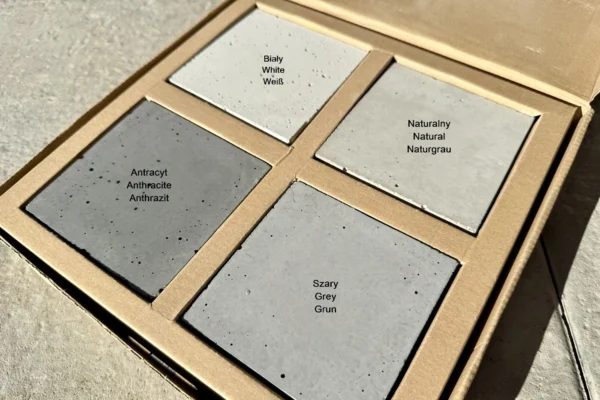 Paleta kolorów produktów Betonova z betonu architektonicznego – cztery podstawowe odcienie: biały, naturalny, szary i antracyt. Przykład wykończenia powierzchni i struktury betonu architektonicznego Betonova, idealny do nowoczesnych wnętrz, elewacji i elementów małej architektury.